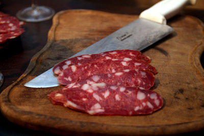 Close-up of meat on cutting board