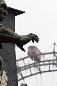 Low angle view of statue against clear sky