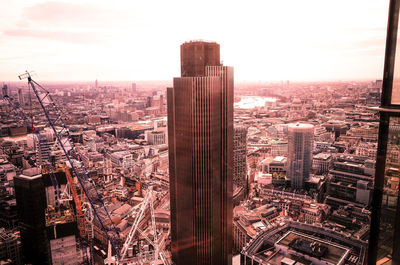 Aerial view of cityscape against sky