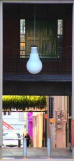 Close-up of illuminated lamp hanging in store