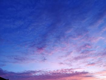 Low angle view of dramatic sky during sunset