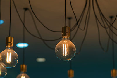 Close-up of illuminated light bulb