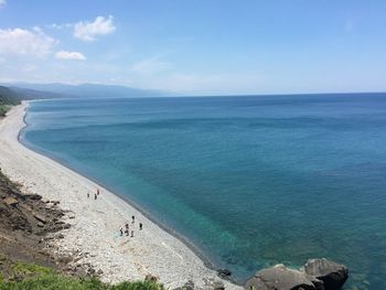 Scenic view of sea against blue sky