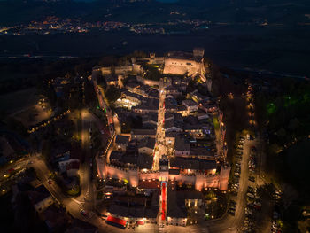 High angle view of illuminated cityscape at night