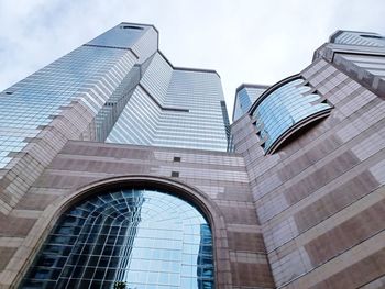 Low angle view of modern buildings against sky