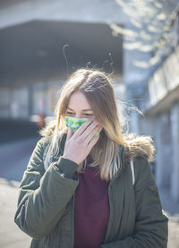 Portrait of young woman in winter