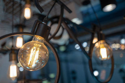 Close-up of illuminated light bulb