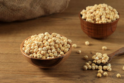 Close-up of almonds in bowl on table