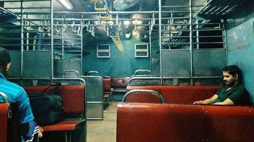 Midsection of woman sitting in bus