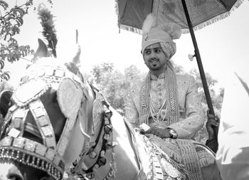 Portrait of smiling young woman outdoors