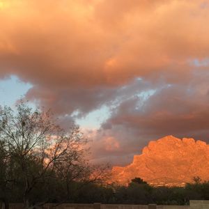 Scenic view of cloudy sky at sunset