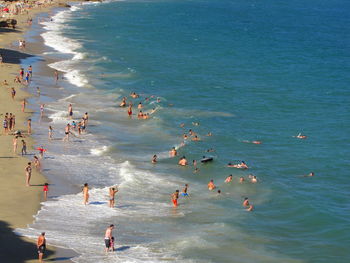 High angle view of people enjoying on shore at costa daurada