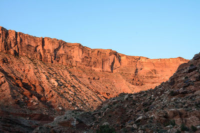 Scenic view of rocky mountains against clear sky