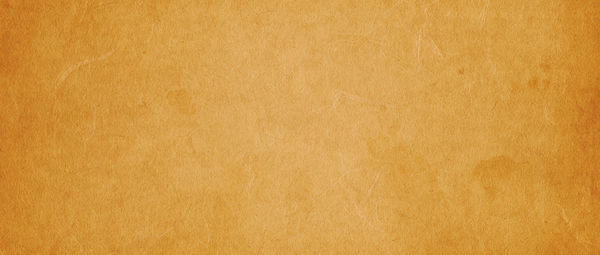 Full frame shot of old yellow paper