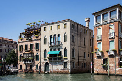 View of buildings against blue sky in venice