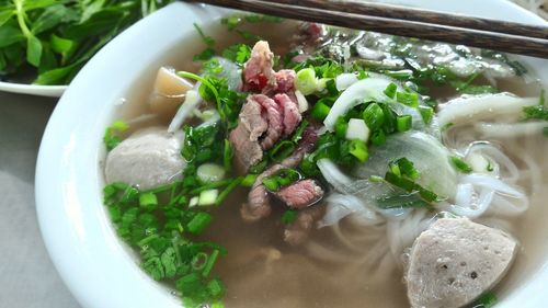 Close-up of pho soup served in bowl