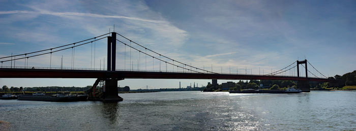 View of suspension bridge over river