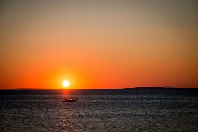 Scenic view of sunset over sea