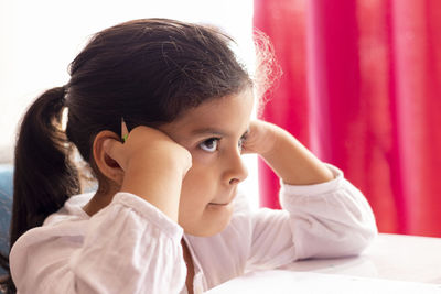 Girl sitting at desk