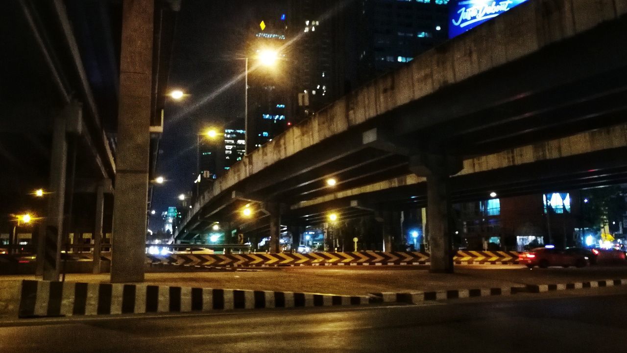 ILLUMINATED STREET AT NIGHT