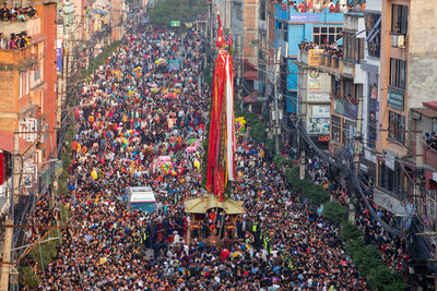 Devotees pull chariots as they take part in the festivities to mark the rato machindranath chariot.