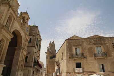 Low angle view of old building against sky