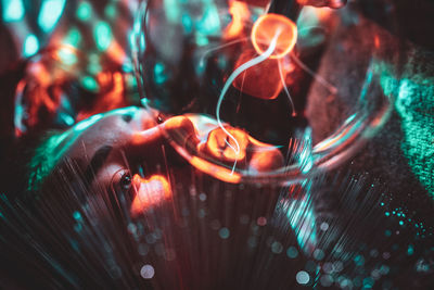 High angle view of illuminated lights in glass