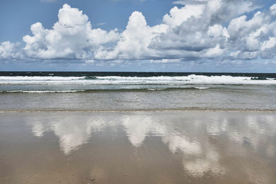 Scenic view of beach against sky