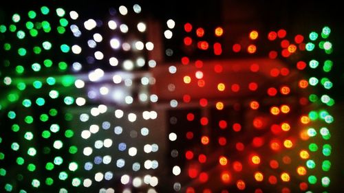 Defocused image of illuminated light bulb