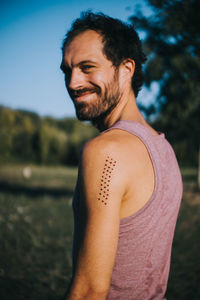 Portrait of man standing outdoors