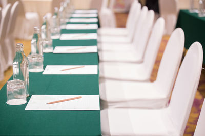 Close-up of paper glasses on table