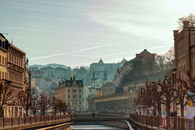 Karlovy vary winter morning walk over bridge river stream