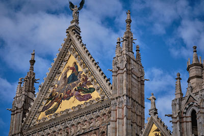 Low angle view of traditional building against sky