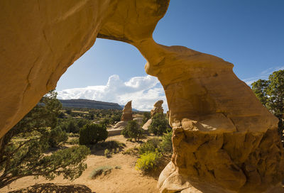 Scenic view of rock formations against sky