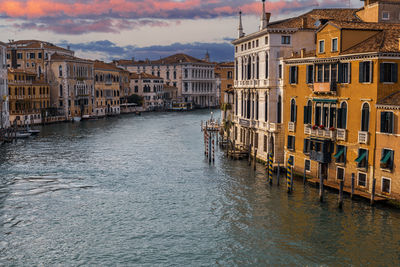 Canal amidst buildings in city