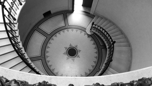 Low angle view of spiral staircase in old building