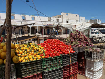 Fruits and vegetables for sale at market stall