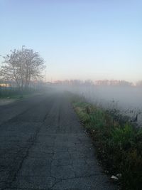 Road amidst landscape against clear sky
