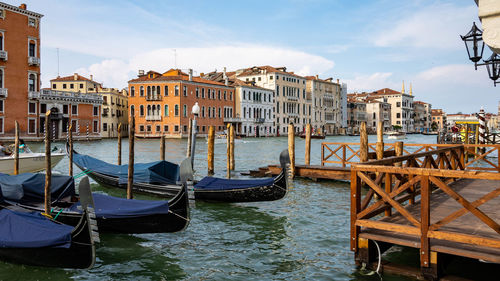 Boats moored at harbor