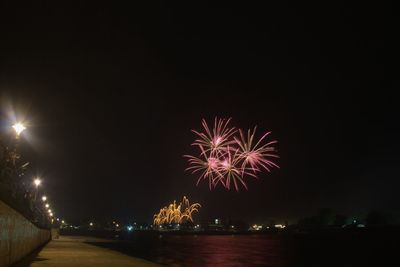 Firework display at night