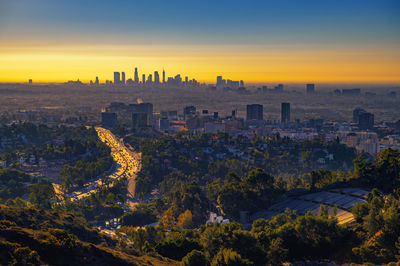 High angle view of cityscape against sky during sunset