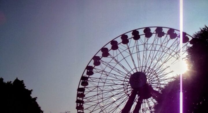 amusement park, amusement park ride, ferris wheel, arts culture and entertainment, sky, silhouette, nature, low angle view, dusk, no people, carnival, clear sky, shape, circle, traveling carnival, architecture, outdoors, geometric shape, sunset, large, wheel, fairground