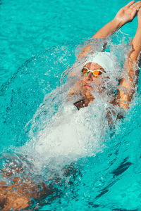 Female athlete swimming in pool