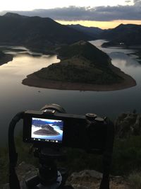 Reflection of mountain in water