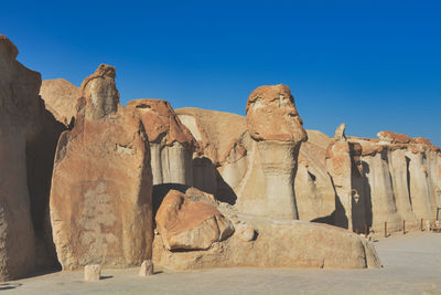 Ancient human face shaped rock formations at al qara mountain, al hufuf. 