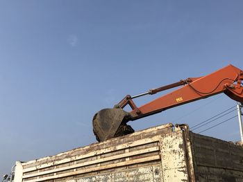 Low angle view of old building against clear sky