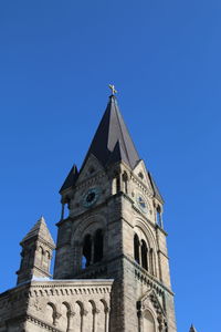 Low angle view of cathedral against clear blue sky