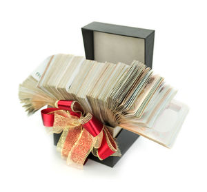 Close-up of colored pencils over white background