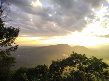 Scenic view of landscape against sky during sunset