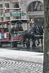 Man in city during winter